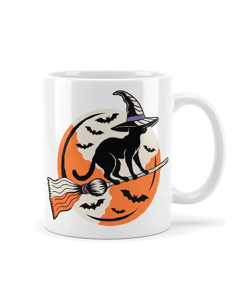 The witch cat design on a white mug